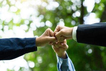 World environment day with global community teamwork, A group of volunteer, business joins hands...