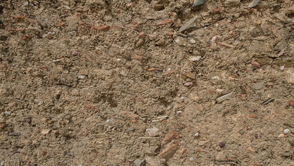 Textured wall. Rural construction area. Old form of housing