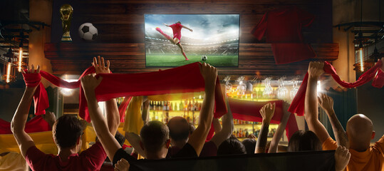 Game Excitement. Lively bar scene showing group of fans cheering favorite football team during live soccer match translation. Concept of championship cup final, competition, game, tournament © master1305