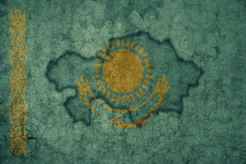 map and flag of kazakhstan on a old vintage crack paper background .