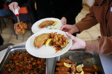 Solidarity meal at caritas.  France.