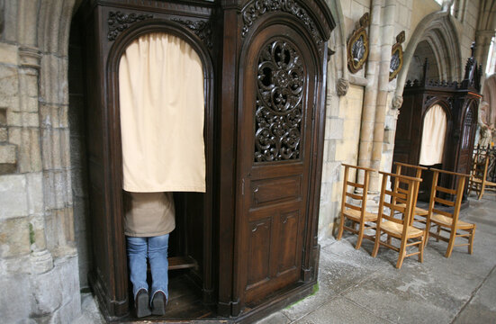 Confessional in a village church. Reconciliation. France.