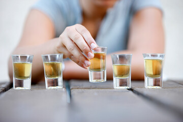 Young and alcohol.  Alcohol addiction and binge drinking concept.