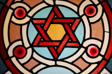 Stained glass window in the Eldrige Street Synagogue. Sar of David. New York. USA.