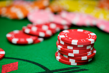 Casino chips on a green mat