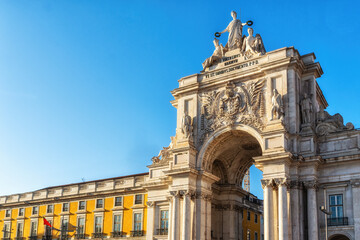 Rua Augusta Arch at dusk in Lisbon, Portugal. View from the Commerce Square (Portuguese: Praca do Comercio, Terreiro do Paco).