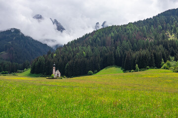Obraz premium Landscape in Villnoess Valley and St. John's Chapel in South Tyrol
