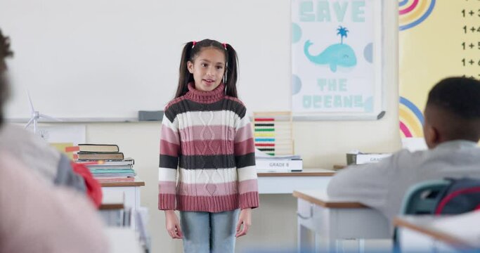 Girl, kid and talking in class for presentation, education and sharing knowledge for project. Female person, speech assessment and test for literacy growth, public speaking and school for language