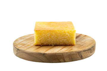 a yellow square piece of food on a wooden plate