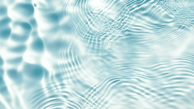 Rippling water, with a focus on the movement and texture of the waves.  Water Ripples and Light Reflections. Serene and Relaxing Water Background. Seamless Looping Animation.