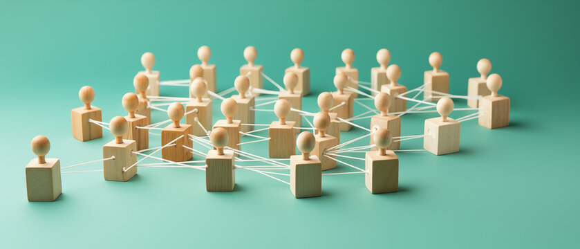 Network of Wooden Figures Symbolizing Social Connections