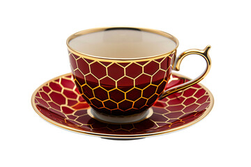 Fototapeta premium a red and gold teacup and saucer