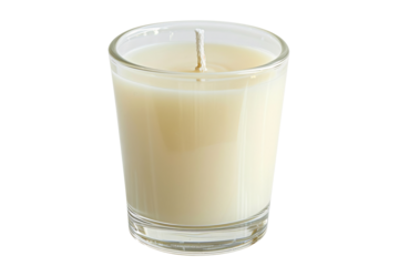 a white candle in a glass