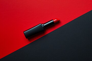Fototapeta premium Elegant red lipstick on a dual-toned background