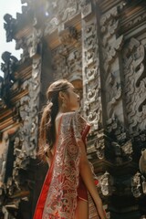 Fototapeta premium Woman Standing in Front of Building