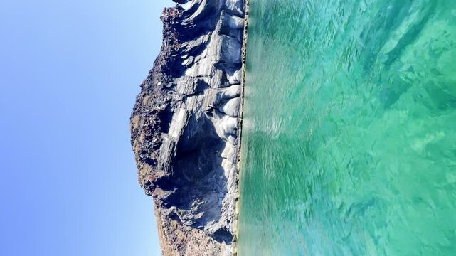 Vertical footage, rock formations on the shores of Isla Coronado, in Loreto, Baja California Sur, Mexico