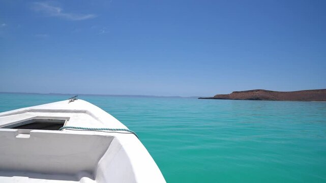 Front of a boat sailing on beautiful blue waters in Isla Espiritu Santo, BCS, Mexico