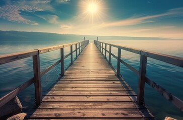 Naklejka premium A wooden pier stretches towards the horizon on a tranquil lake at dawn