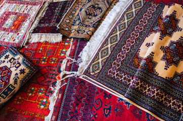 traditional oriental Arab Turkish handmade colorful carpets at the bazaar in Turkey in Istanbul