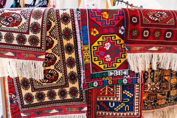 Colorful expensive modern Arabic carpets on the oriental bazaar