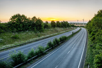 Fototapeta premium empty UK motorway in England at sunrise with no traffic