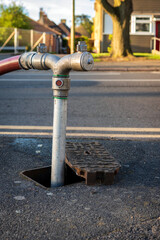 Fire hydrant connection point to supply water on road in england uk
