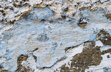 Old white, blue painted wall.