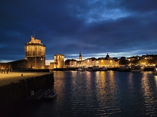 La Rochelle harbor by night, France