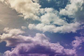 Beautiful sunset sky above clouds with dramatic light. Cabin view from airplane