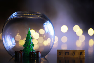 Decorated christmas tree pine on blurred gold background bokeh light banner.