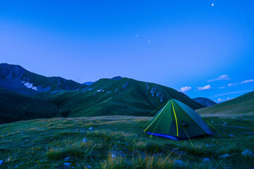 Tent Set Up at a Mountain Campsite, Starlit Night