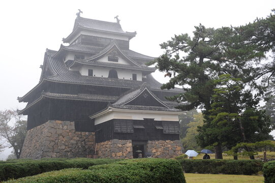 Matsue, Shimane / Japan - November 5, 2011: Matsue castle on a rainy and foggy day in Matsue city, Japan