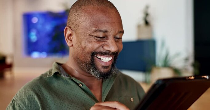 Online, home and black man with tablet, laughing and searching for comedy to watch, weekend and relax. House, digital and person on sofa, funny series and subscribe to website for film and in lounge