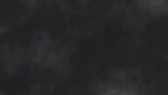 Moving Shimmering stormy dark gray clouds