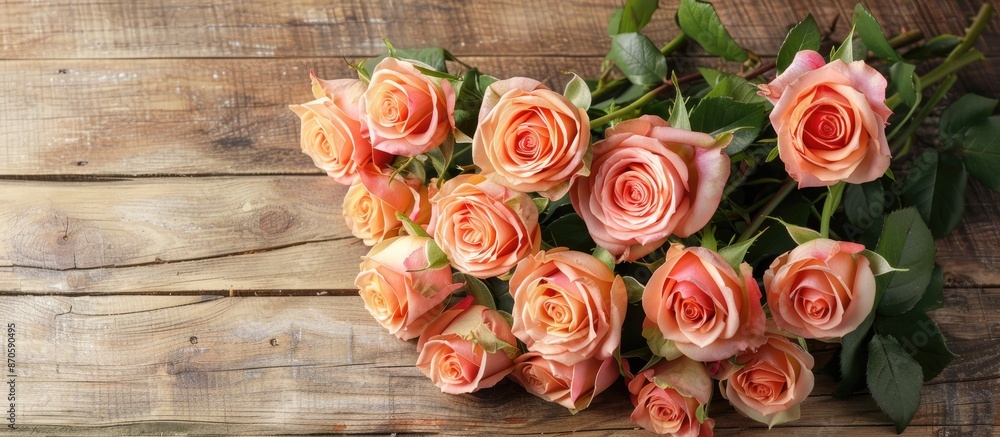 Poster Arranged bouquet of roses on a wooden background with space for image insertion. image with copy space