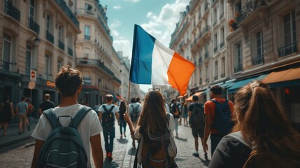 Fototapeta premium A sports fans of the national team French flag on his on a Parisian street back view. Football and sport concept