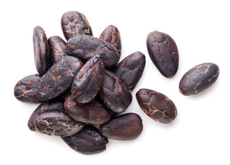 Cocoa beans scattered on white. Top view