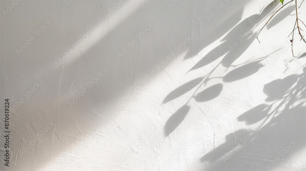 Poster a subtle interplay of light and shadow on a white wall, with an angled shadow from a forgotten objec