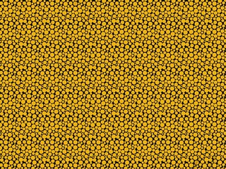 a yellow background with black dots, geometric patterned fabric