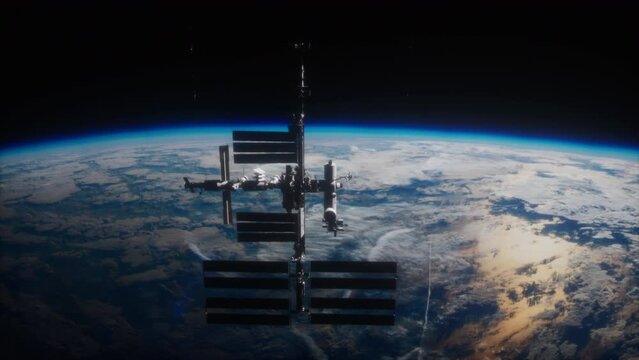 International Space Station illuminated by the sun viewed from a satellite in its orbit. Elements furnished by NASA