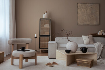 Elegant composition of warm living room interior with mock up poster frame, modular sofa,...