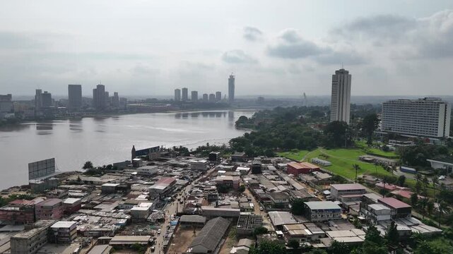 Aerial view of slums and the city of Abidjan, Ivory Coast
