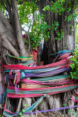 A spirit house or Joss house built for guardian spirit to reside with Traditional thai costumes and...
