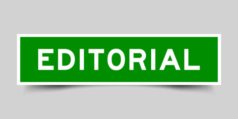 Green color square label sticker with word editorial that inserted in gray background