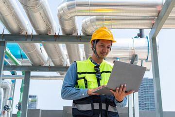 Engineer under industrial inspection Large water heaters are used in high-rise condominiums