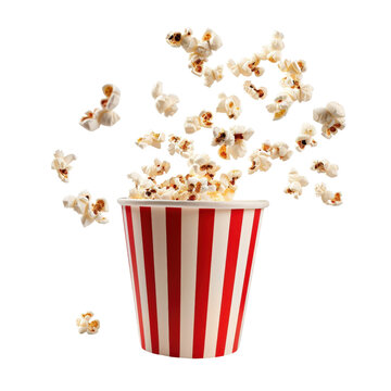 Freshly popped popcorn spilling out of a classic red and white striped container, isolated on a white background.