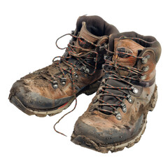 Worn and muddy hiking boots isolated on white background, perfect for outdoor adventure and rugged terrain themes.