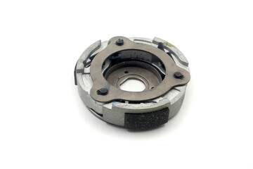 Naklejka premium centrifugal clutch set of motorcycle or scooter on white background .Motorcycle automatic clutch uses centrifugal force with the driving shaft nested inside the driven shaft.