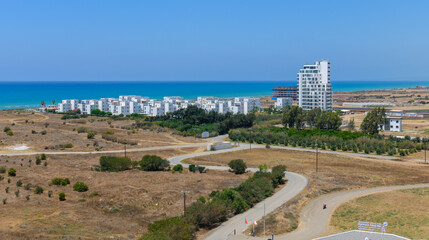 Obraz premium view from the roof of the house to the garden, village and sea in Cyprus