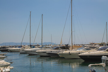 Boats in the marina. Beautiful white yachts parked on the sea coast, Naples, Italy